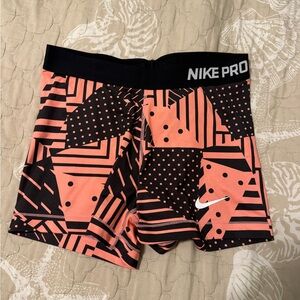 Nike Pro Women's Athletic Shorts - Black and Coral
